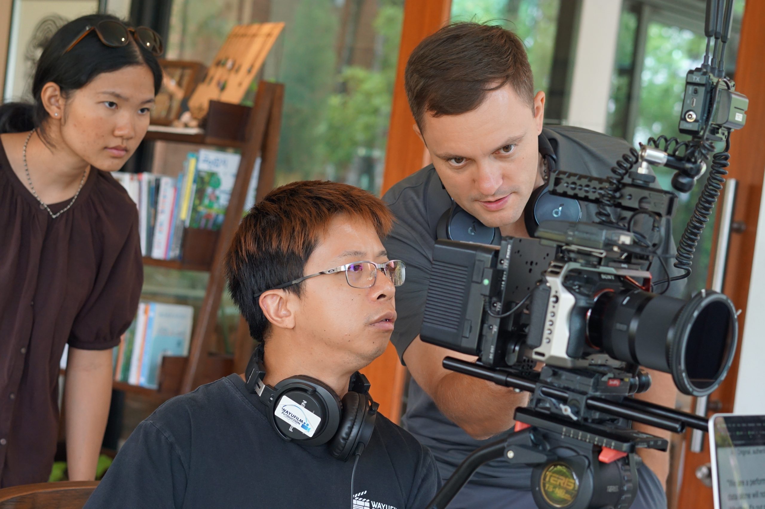 Production team reviewing footage on a camera monitor
